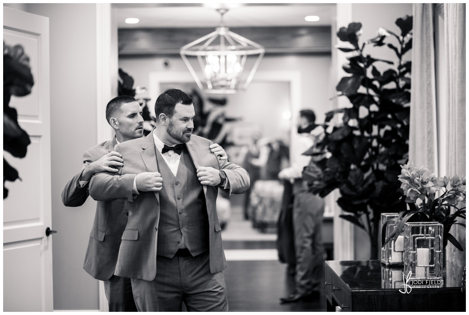 Groom and his best man preparing for  his walk down the isle at the Pelican  Club