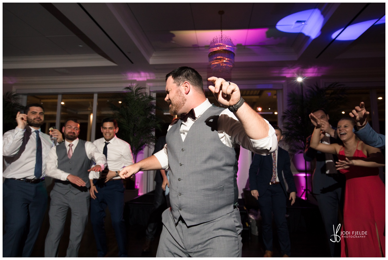 groom getting down to some great music
