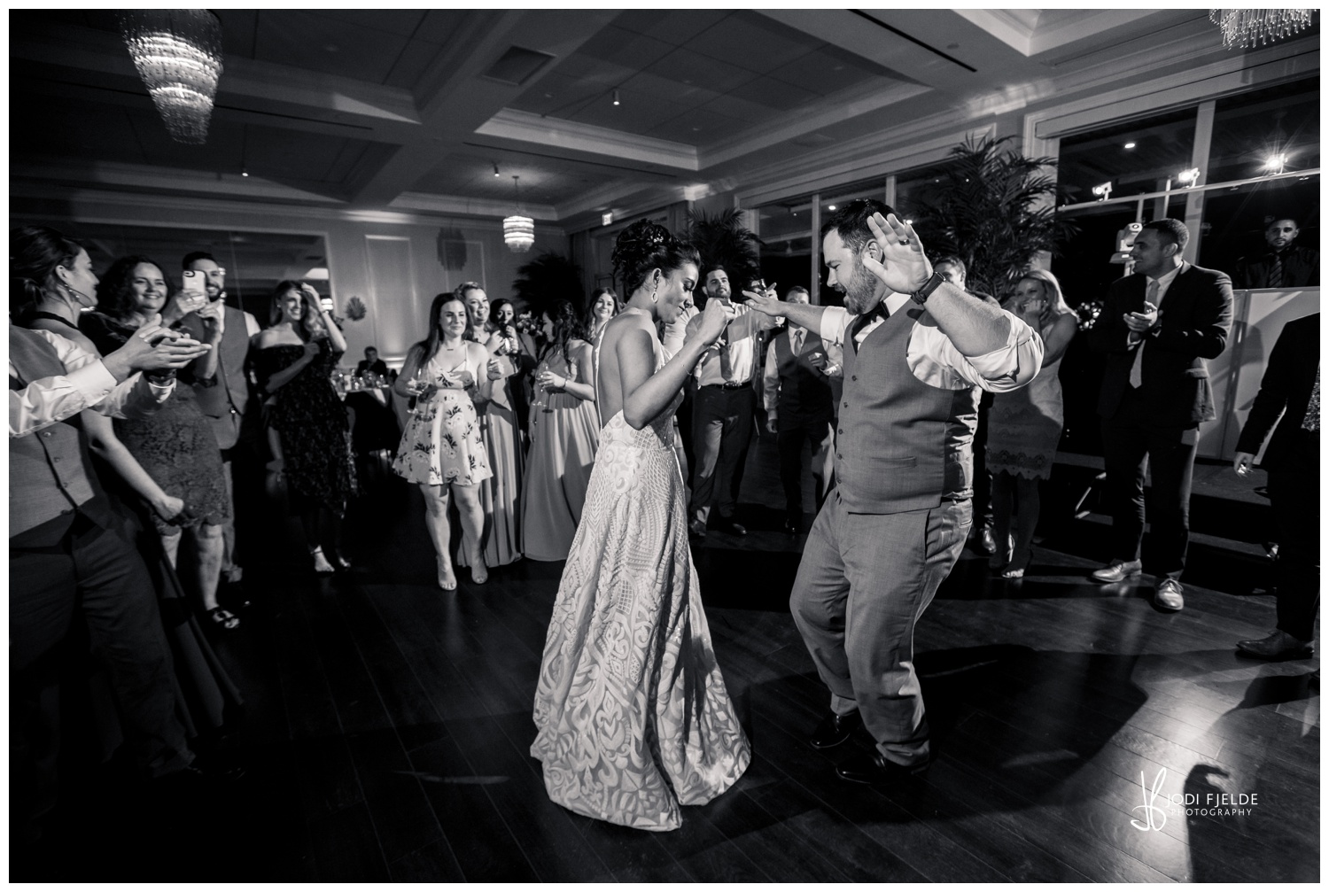 bride and groom dancing at reception
